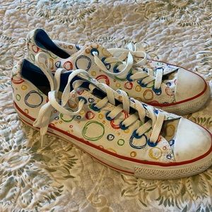 Converse white with multi colored circles low tops